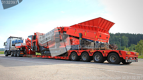 Image of Volvo FH Hauls a Heavy Load on Double Drop Deck Trailer