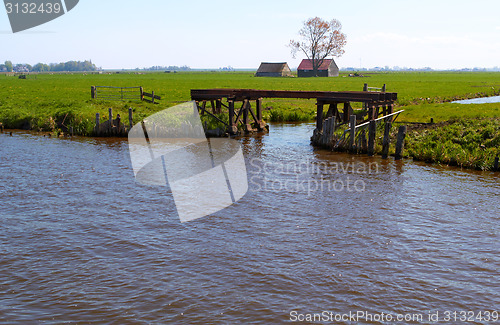 Image of Dutch countryside with waterway and gateway