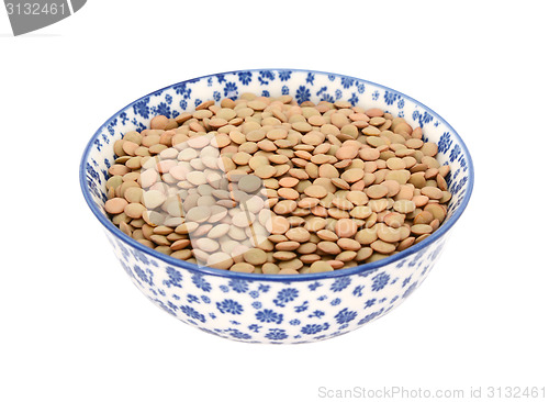 Image of Green lentils in a blue and white china bowl