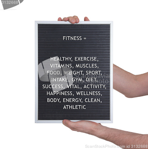 Image of Fitness concept in plastic letters on very old menu board