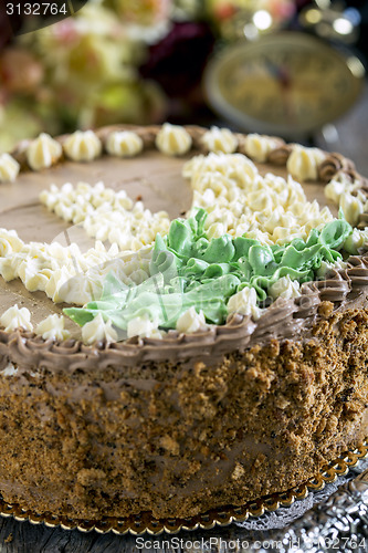 Image of Walnut cake with butter cream.