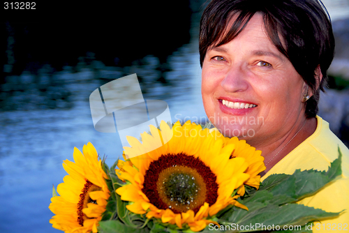Image of Woman sunflowers