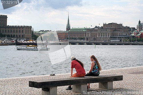 Image of Embankment of Norrström river with the view of Royal Palace, St