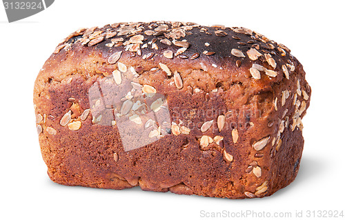 Image of Unleavened black bread with nuts seeds and dried fruit rotated