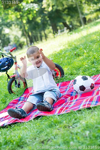 Image of boy with airpane toy