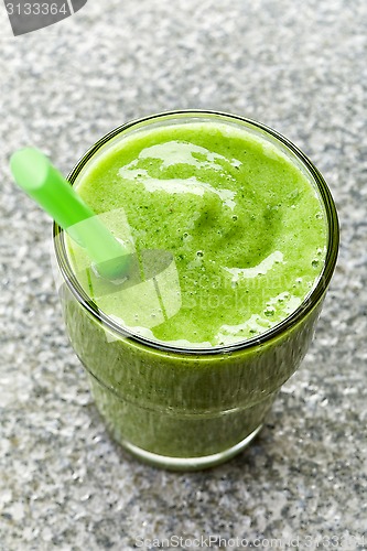 Image of glass of green smoothie