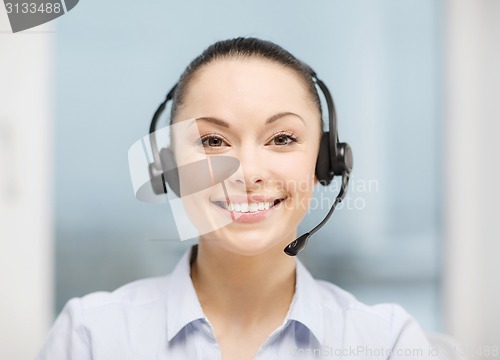 Image of female helpline operator with headphones