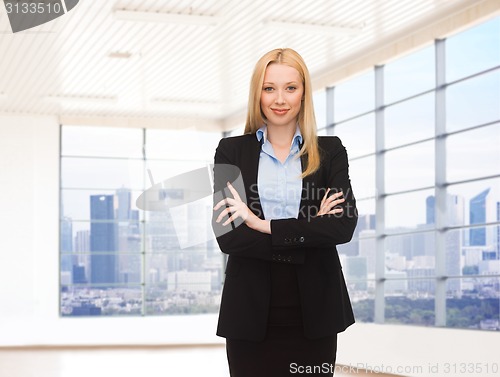Image of young smiling businesswoman