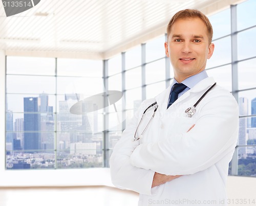 Image of smiling male doctor with stethoscope