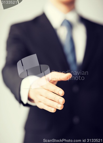 Image of businessman with open hand