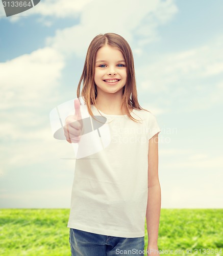 Image of girl in blank white t-shirt showing thumbs up