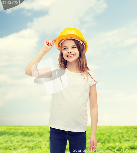 Image of smiling little girl in protective helmet