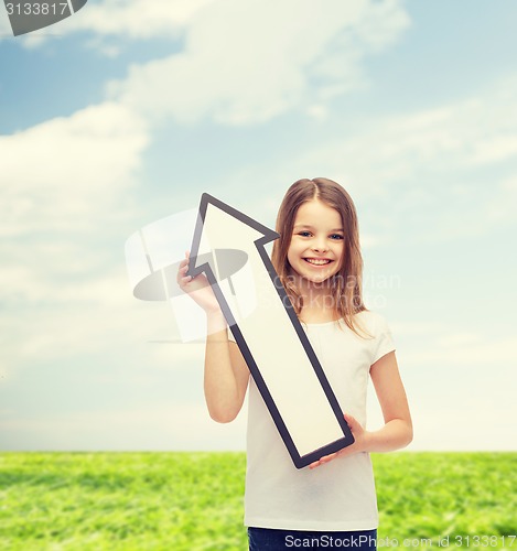 Image of smiling little girl with blank arrow pointing up