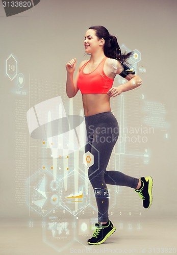 Image of sporty woman running or jumping