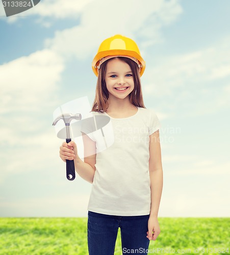 Image of smiling little girl in protective helmet