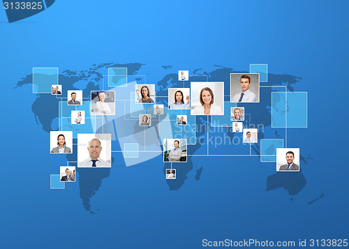 Image of pictures of businesspeople over world map