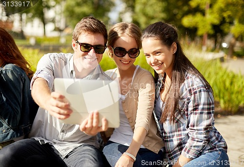 Image of students or teenagers with laptop computers