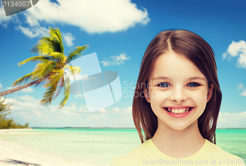 Image of smiling little girl over white background