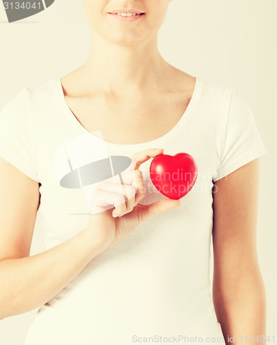 Image of woman hands with heart