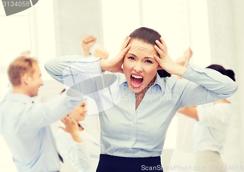 Image of angry screaming businesswoman