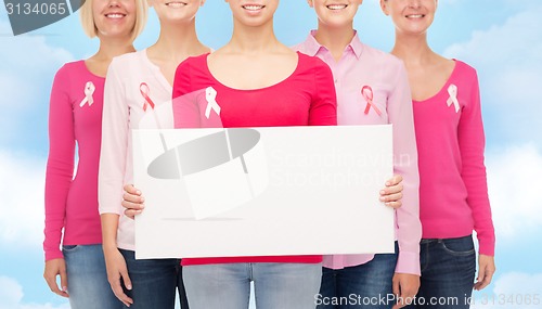 Image of close up of women with cancer awareness ribbons