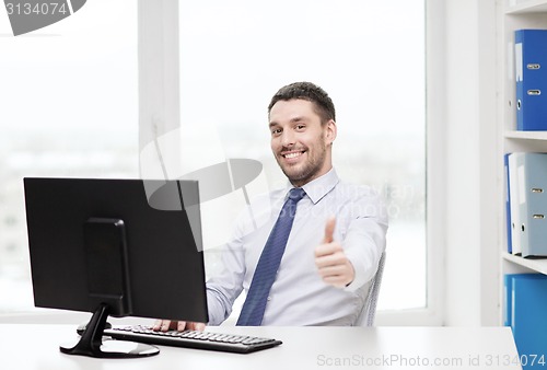 Image of smiling businessman or student with computer