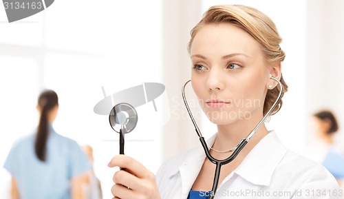 Image of young female doctor with stethoscope