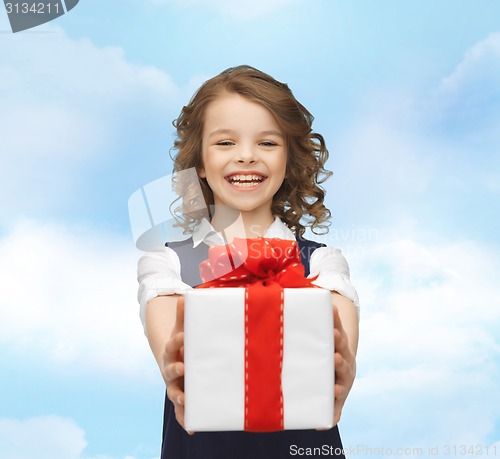 Image of happy smiling girl with gift box