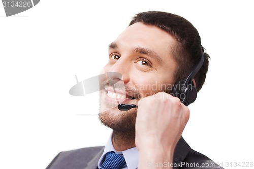 Image of close up of smiling businessman with smartphone