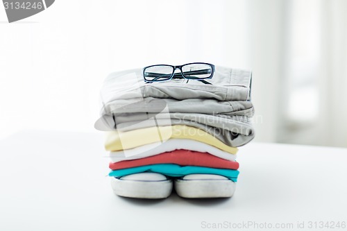 Image of close up of clothes and accessories on table