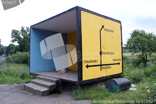 Image of Dog on the bus stop