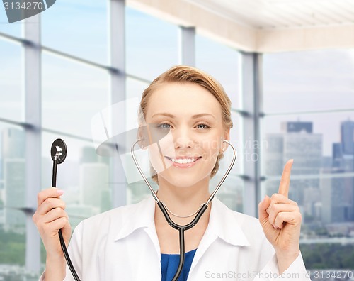 Image of happy female doctor with stethoscope