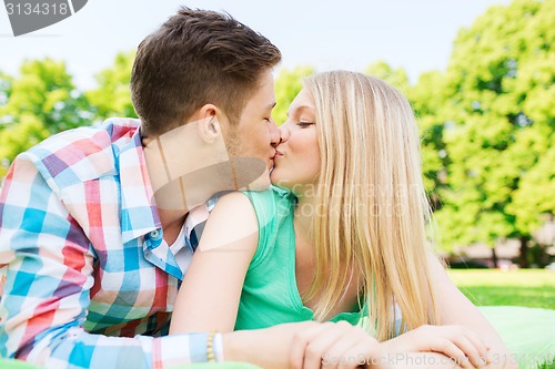 Image of smiling couple in park
