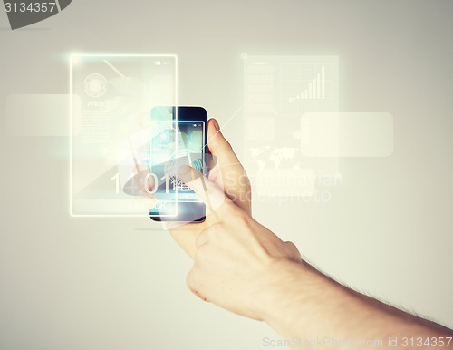 Image of man hand with smartphone and virtual screen