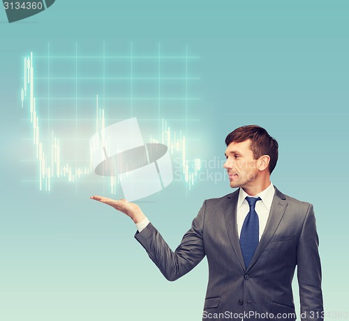 Image of buisnessman or teacher showing forex chart