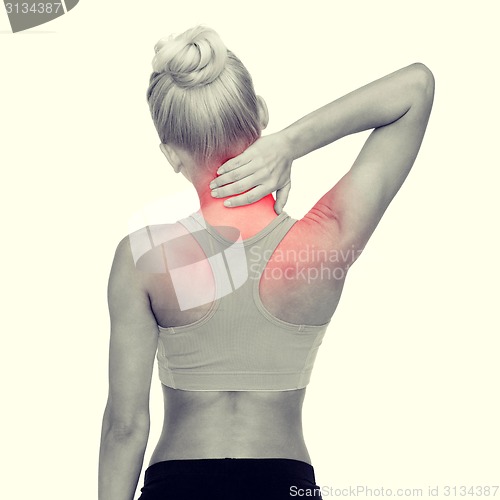 Image of sporty woman touching her neck