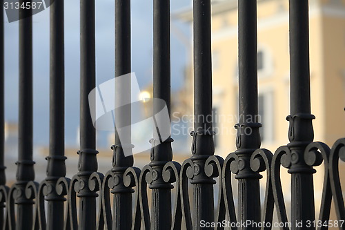 Image of Sun behind the fence