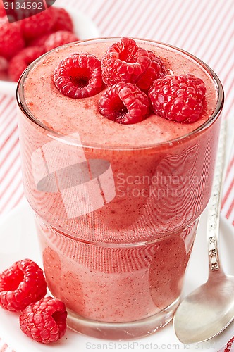 Image of glass of raspberry and banana smoothie