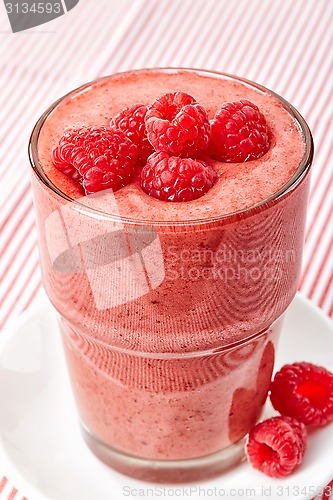 Image of glass of raspberry and banana smoothie