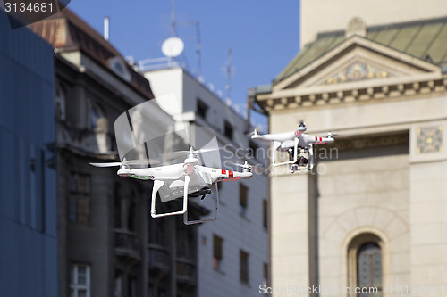 Image of Two Drone to fly in the city