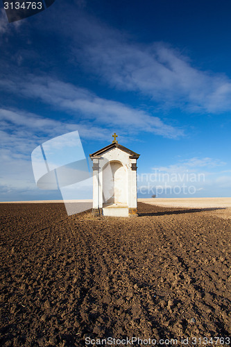 Image of A small chapel in the middle of fields