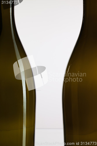 Image of Empty bottles of wine and romantic symbol