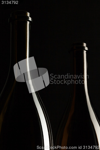 Image of Silhouettes of elegant wine bottles