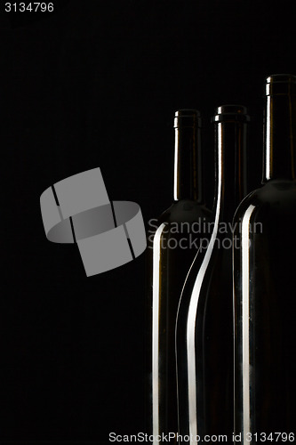Image of Silhouettes of elegant wine bottles