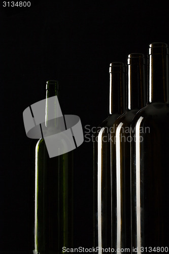 Image of Silhouettes of elegant wine bottles