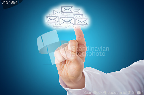 Image of Finger Touching Email Icons Shaping A Cloud Symbol