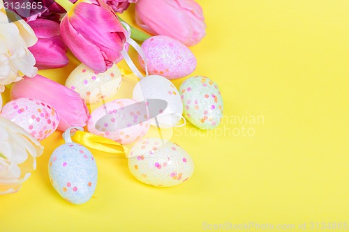 Image of Easter eggs and pink tulips