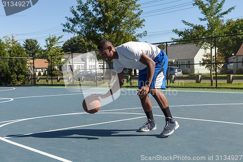 Image of Basketball Player Dribbling