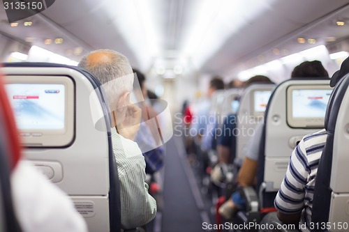 Image of Passengers on the airplane.