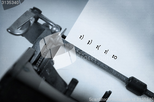 Image of Old typewriter with paper